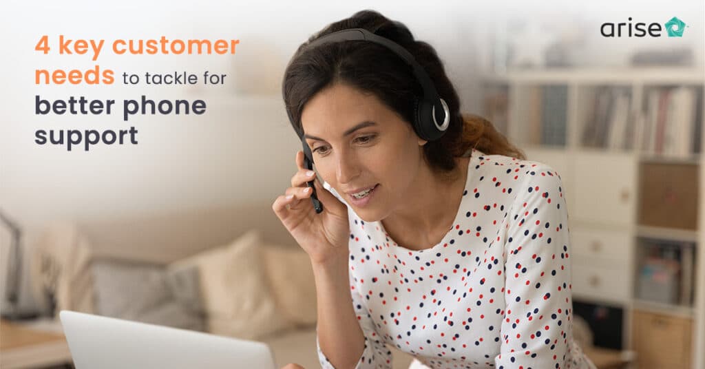 A woman sitting at a desk and wearing a headset and responding to customer service needs