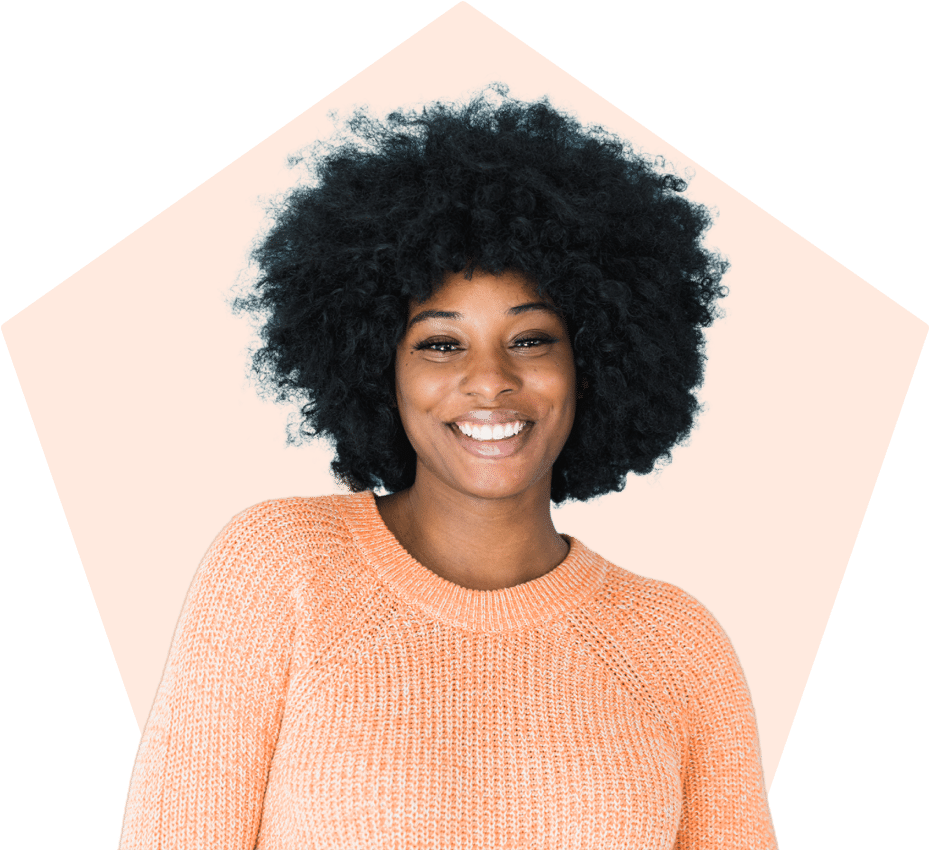 Smiling woman wearing an orange sweater.