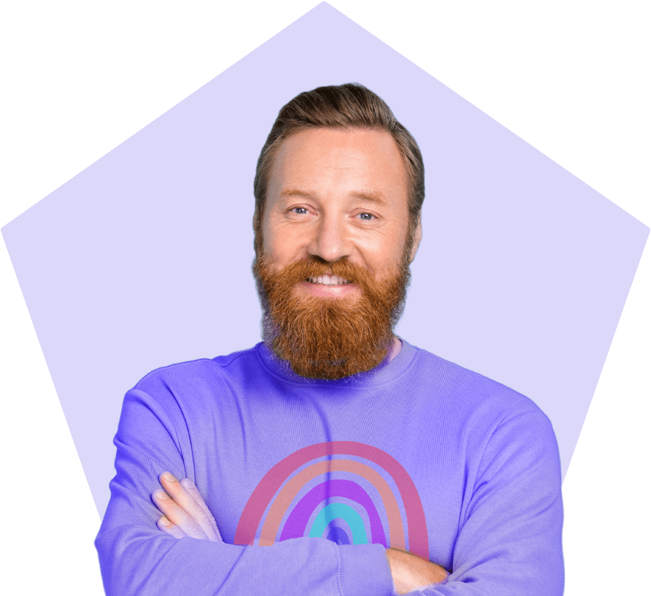 Smiling man wearing a purple shirt with a rainbow.