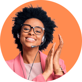 Smiling woman wearing headset and glasses.