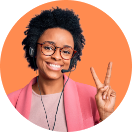 Smiling woman wearing headset and glasses.