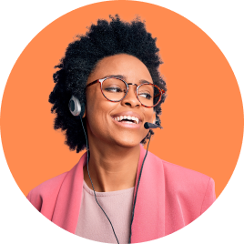 Smiling woman wearing headset and glasses.
