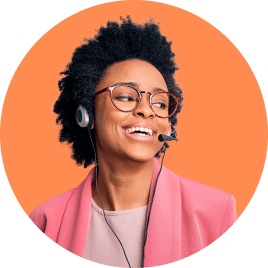 Smiling woman wearing headset and glasses.
