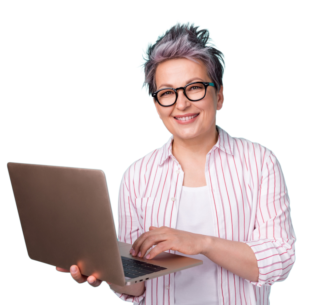 Smiling woman wearing glasses and holding a laptop.