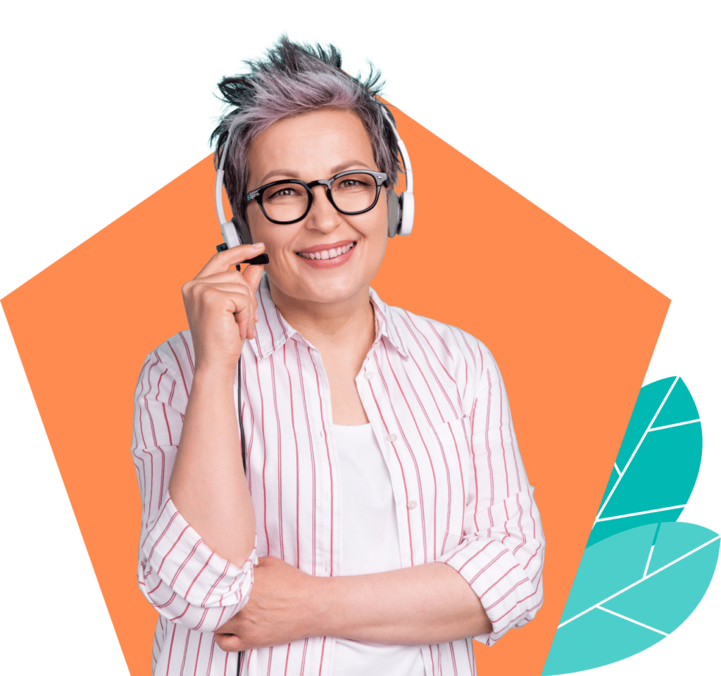 Smiling woman wearing glasses and a headset.