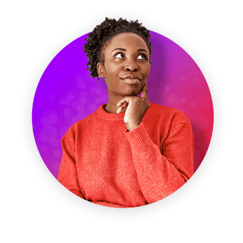 Woman smiling and wearing an orange sweater and looking up.