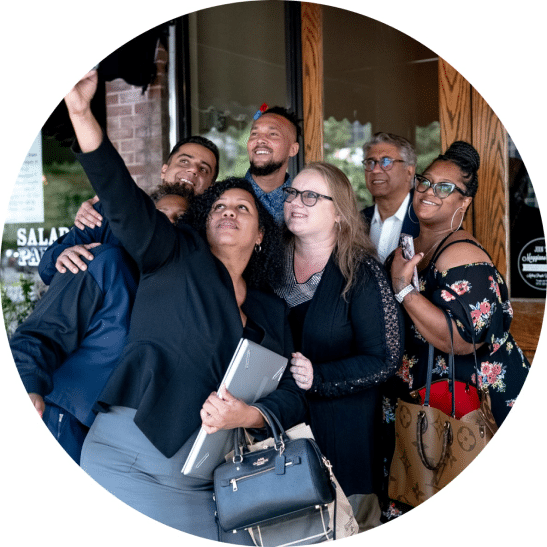 Group of Service Partners and Arise CEO taking a selfie.